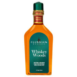 Clubman Pinaud Whiskey Woods aftershave bottle, 6oz, featuring a dark, woodsy label design with a classic cap.