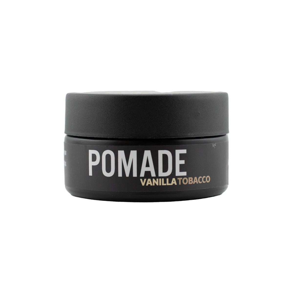 Heavy hold pomade from The Good Sh*t Mens Grooming for styling, with a jar of the product and a styling comb.