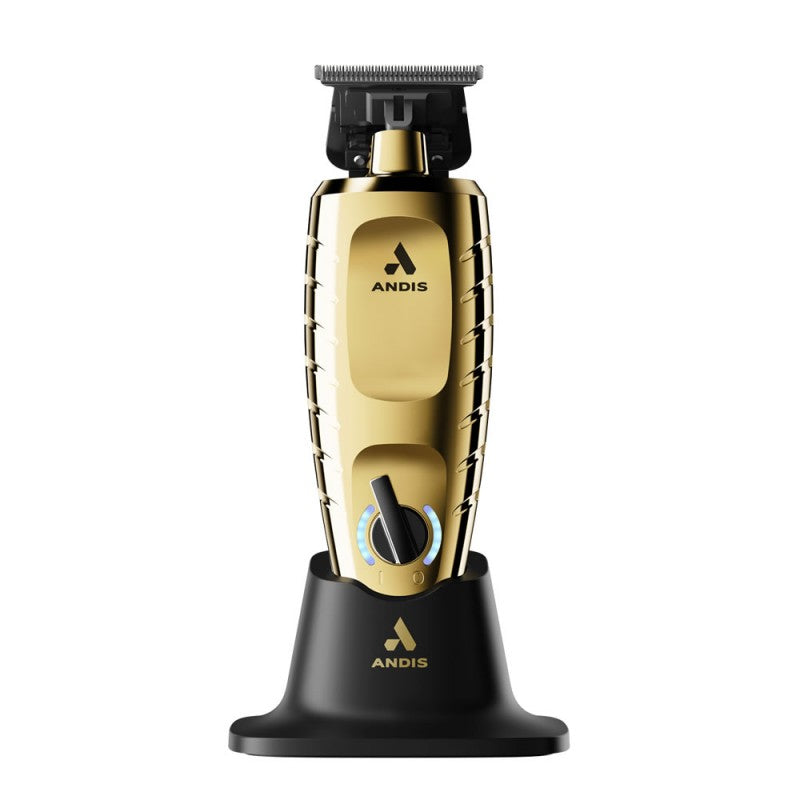 Andis GTX-EXO II Trimmer in gold with straight blades, displayed in stand, close-up front view highlighting professional grooming tool