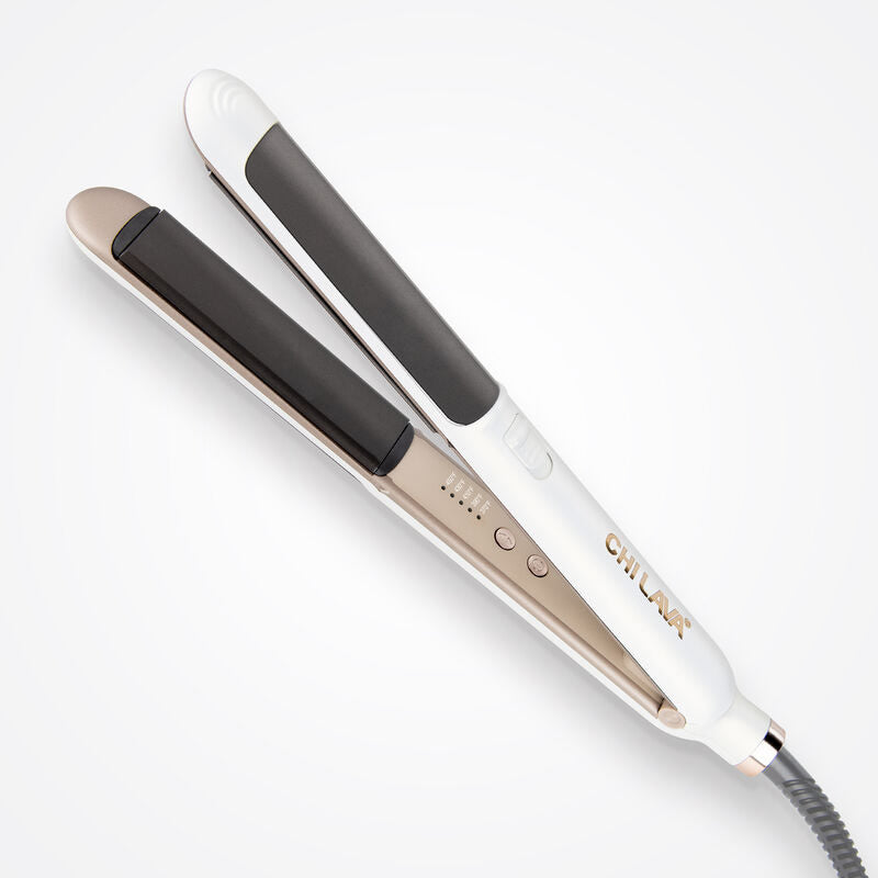 CHI Lava 4D Styling Iron 1-inch white straightener by Chi Tools, with ceramic plates for sleek, shiny hair styling.