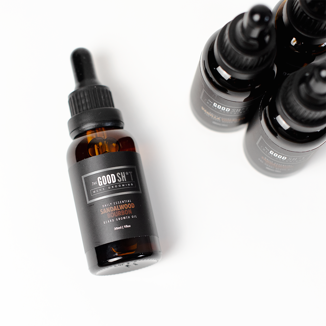 Beard growth oil from The Good Sh*t Mens Grooming featuring sandalwood scent, 1oz bottle for overnight beard care.