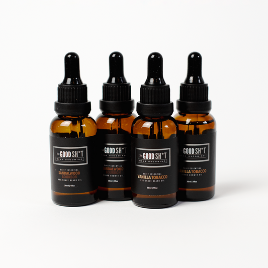 A 1oz bottle of The Good Sh*t Overnight Beard Growth Oil, with dropper and beard grooming branding on the label.