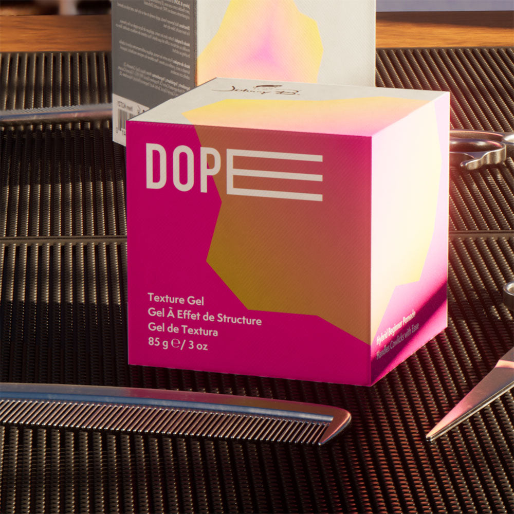 Johnny B Dope Texture Gel in 3oz jar, showing the styling product with a clear label and silver lid on a plain background.