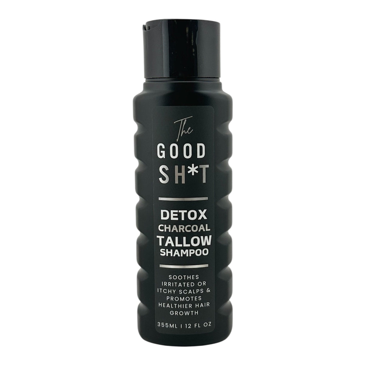 The Good Sh*t Charcoal Tallow Shampoo bottle, natural grooming product for men's hair, with black and white label design.
