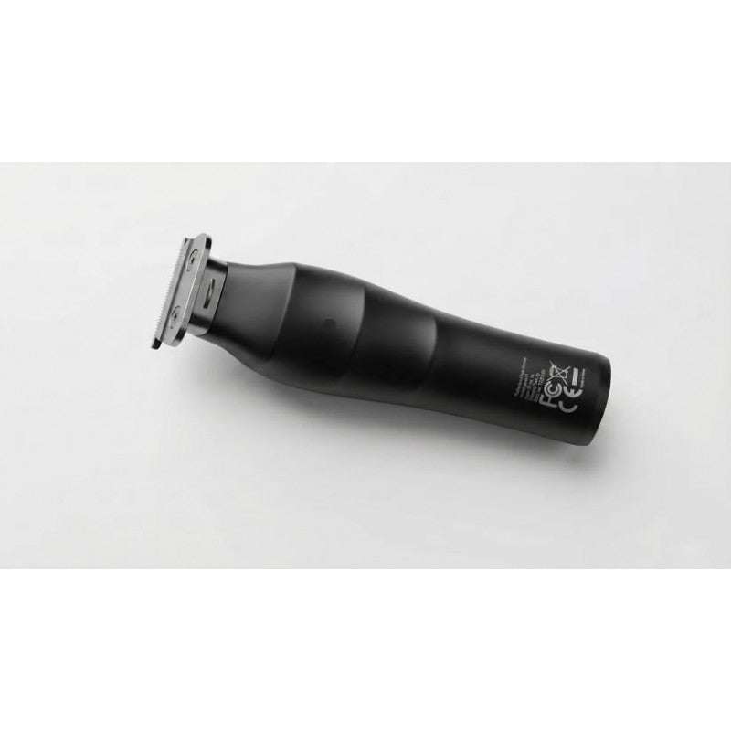 UNKWN Vortex Cyclone Trimmer with ergonomic handle and precision blades, designed for efficient trimming and grooming.