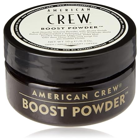American Crew Boost Powder 0.35oz in a sleek container for adding volume and texture to hair styling.