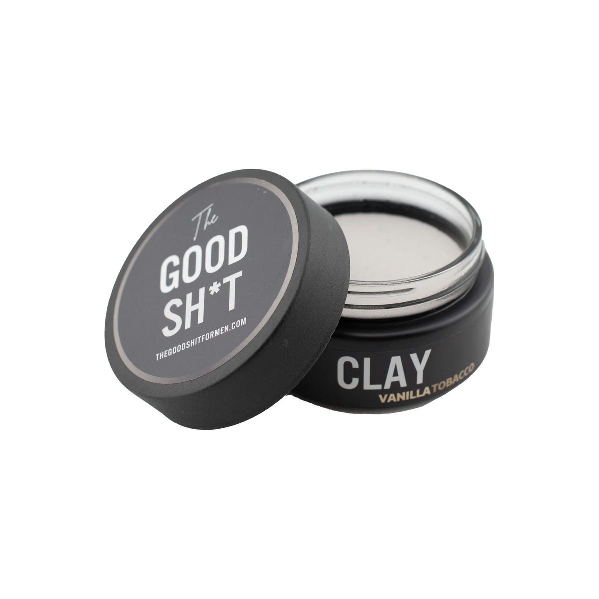 Creamy clay pomade from The Good Sh*t Mens Grooming, shown in a jar with a smooth, matte finish for styling hair.