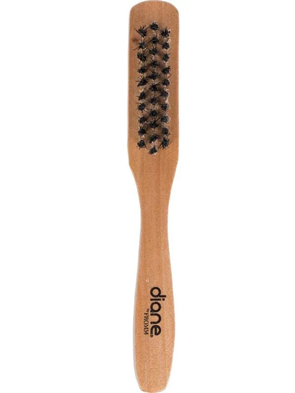 Diane Clipper Cleaning Brush, a durable handheld brush with bristles designed for cleaning clipper blades and grooming tools.