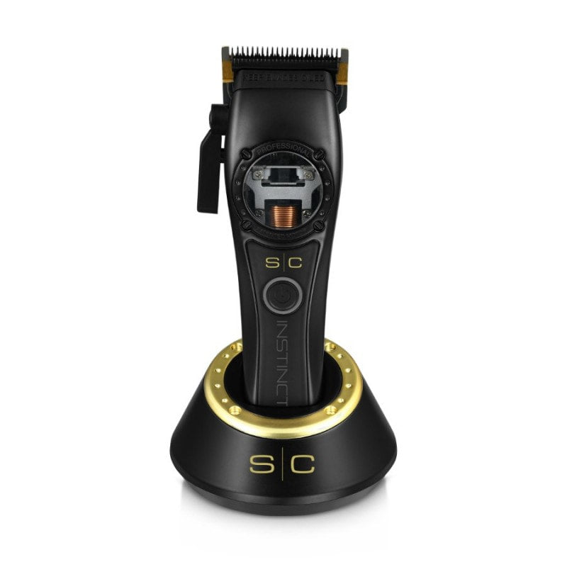 StyleCraft Instinct Clipper showing sleek black body and stainless steel blades for professional grooming.