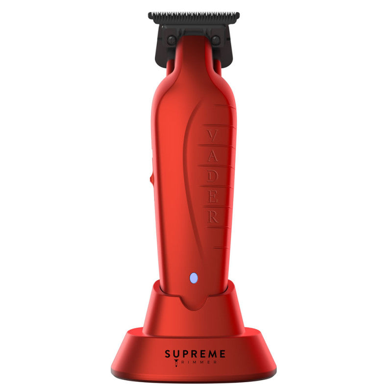 Supreme Trimmer Vader Trimmer in red, a professional grooming tool with adjustable blades and ergonomic handle.