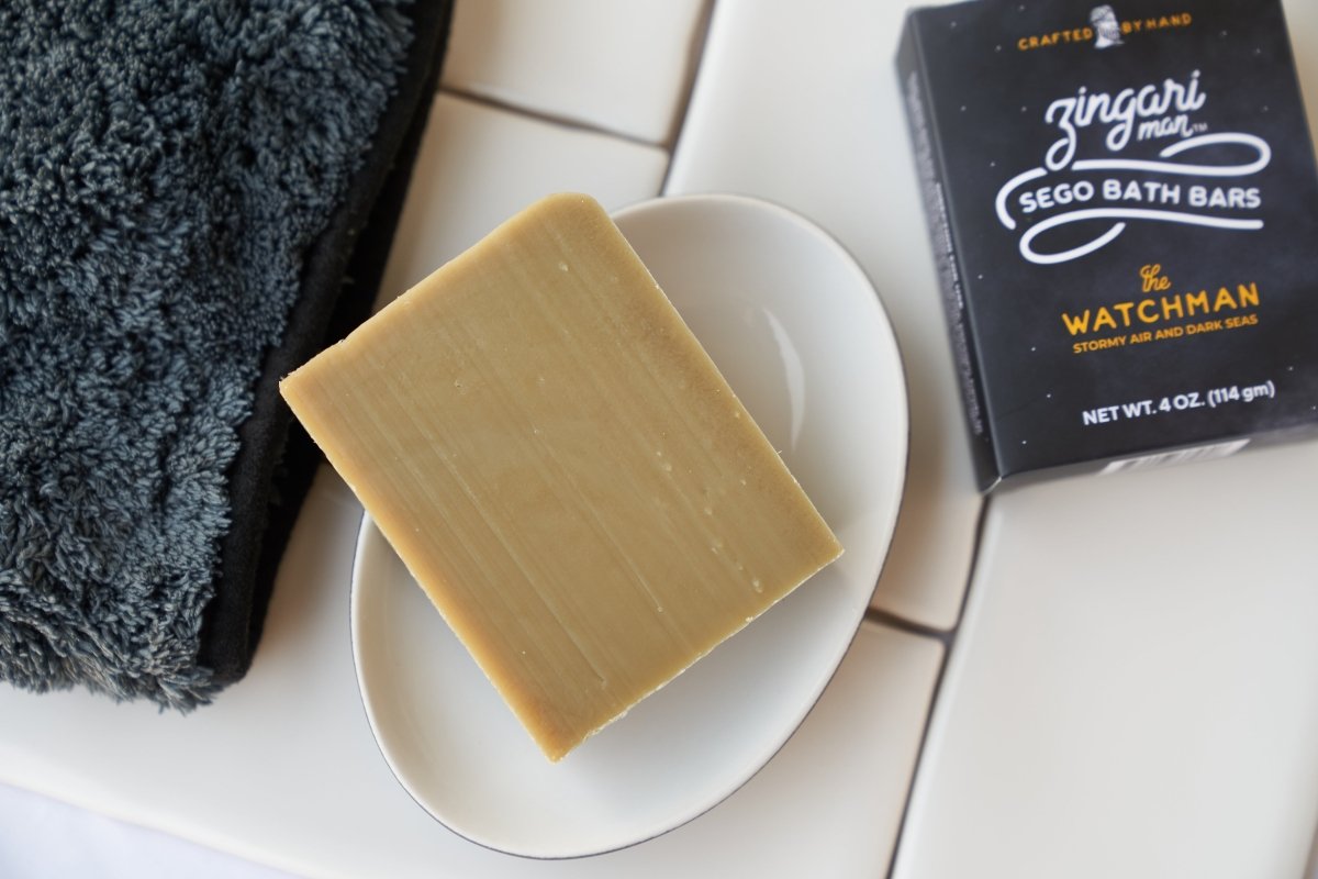 Zingari Man The Watchman bath bar shampoo and conditioner with natural ingredients, shown in a sleek, rectangular soap bar.
